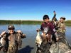 Jr. hunt kids with ducks and goose in boat.jpg